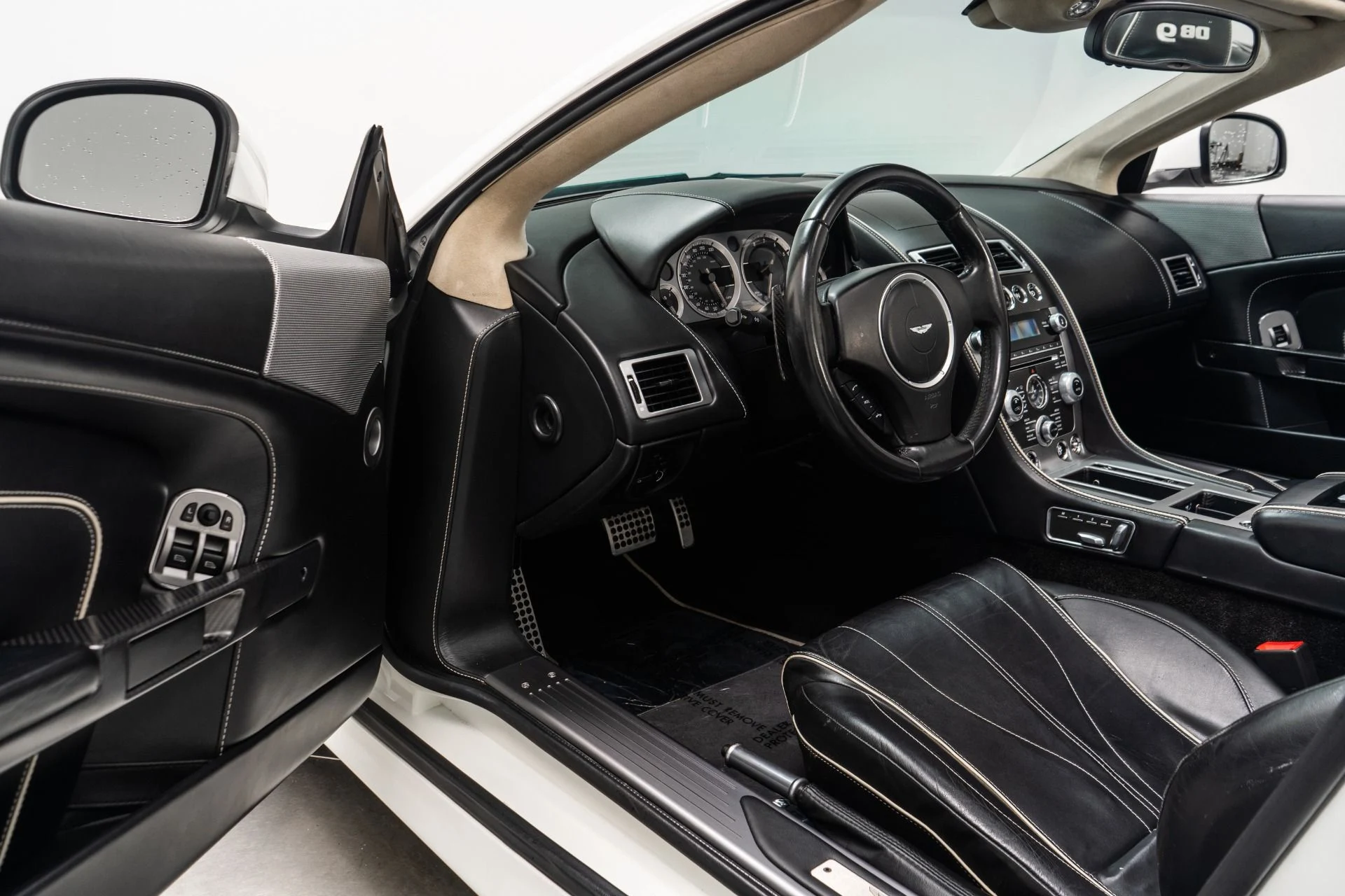 mph022_2507316917_Used_2014_Aston_Martin_DB_9_Volante_1756221007_fa637b0509