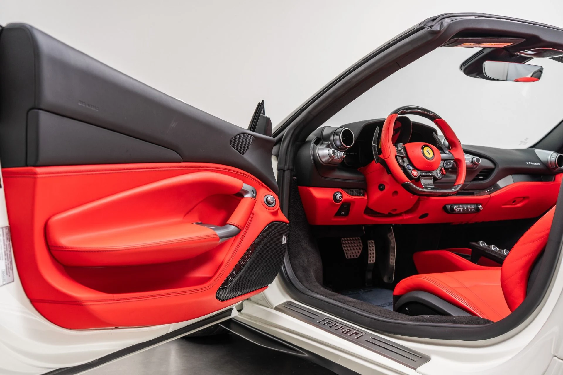 mph022_2788654785_Used_2023_Ferrari_F8_Spider_Low_Miles_Two_Tone_Paint_Carbon_Driving_Zone_Passenger_Display_1789405204_c64e3eec8b
