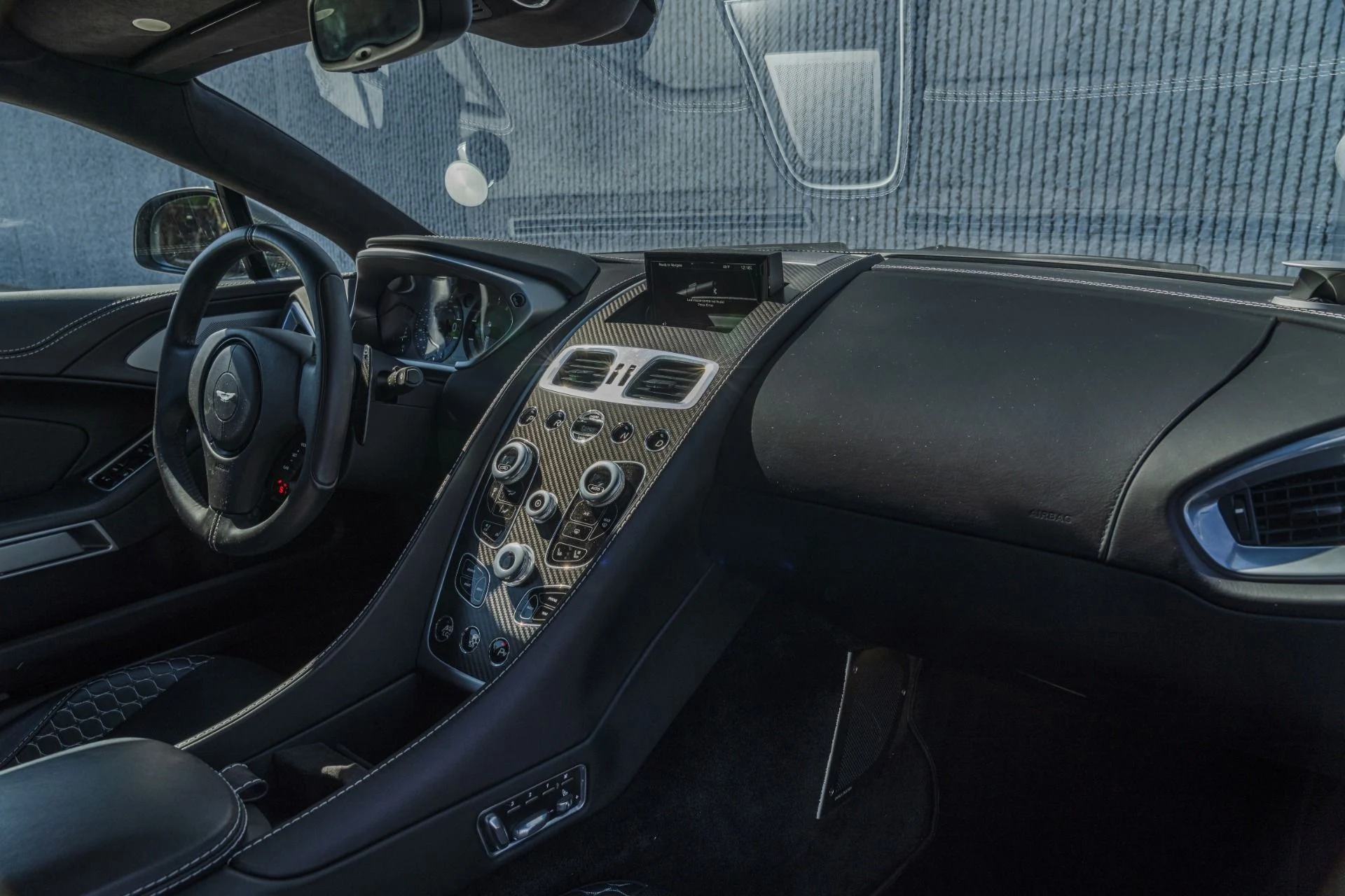mph022_3403663697_Used_2014_Aston_Martin_Vanquish_w_Quilted_Stitching_Carbon_Interior_Carbon_Exterior_1757455355_a6efac40ea