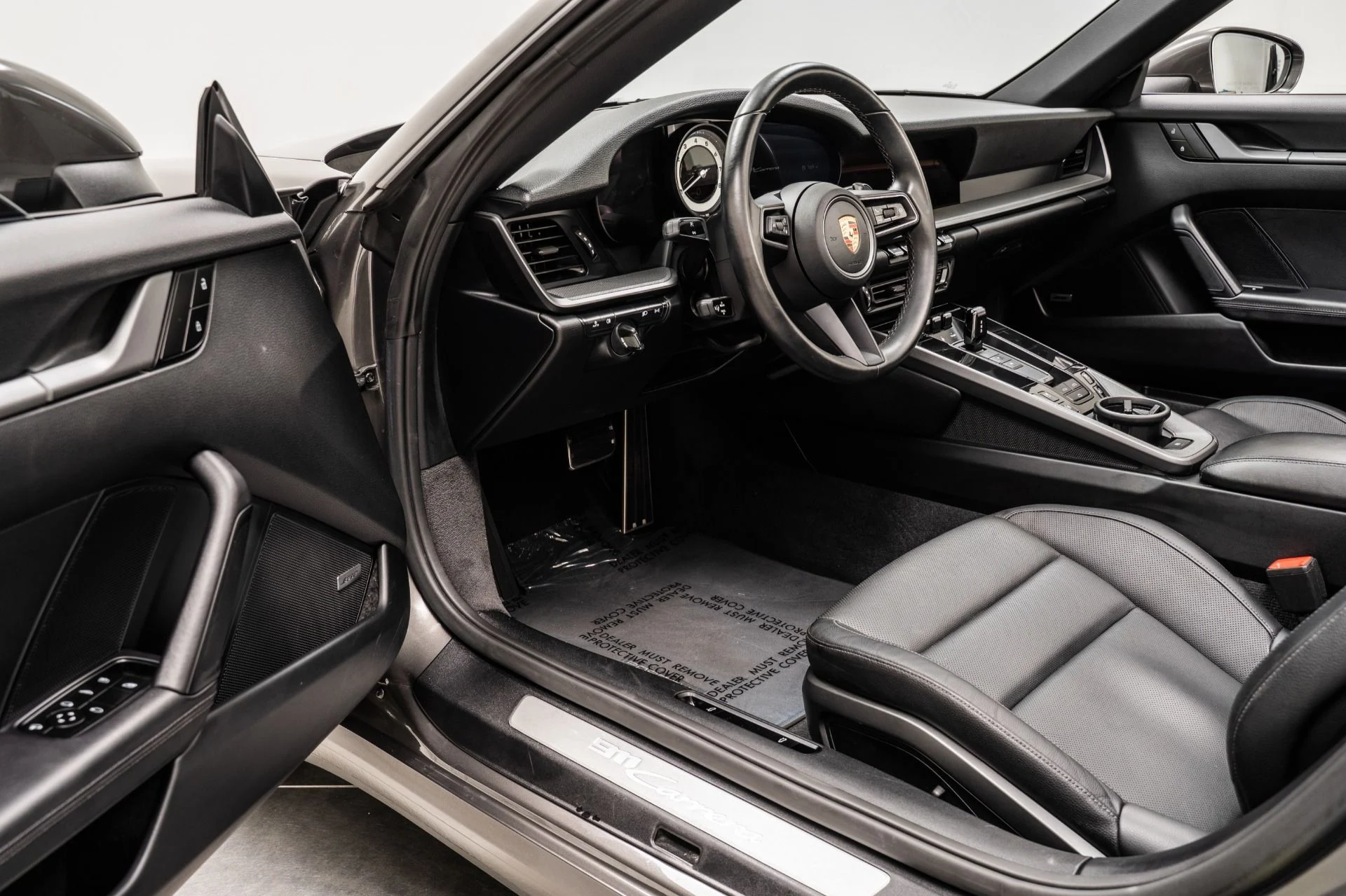 mph022_3415301227_Used_2024_Porsche_911_Carrera_Cabriolet_1758206990_26ef1b1b38