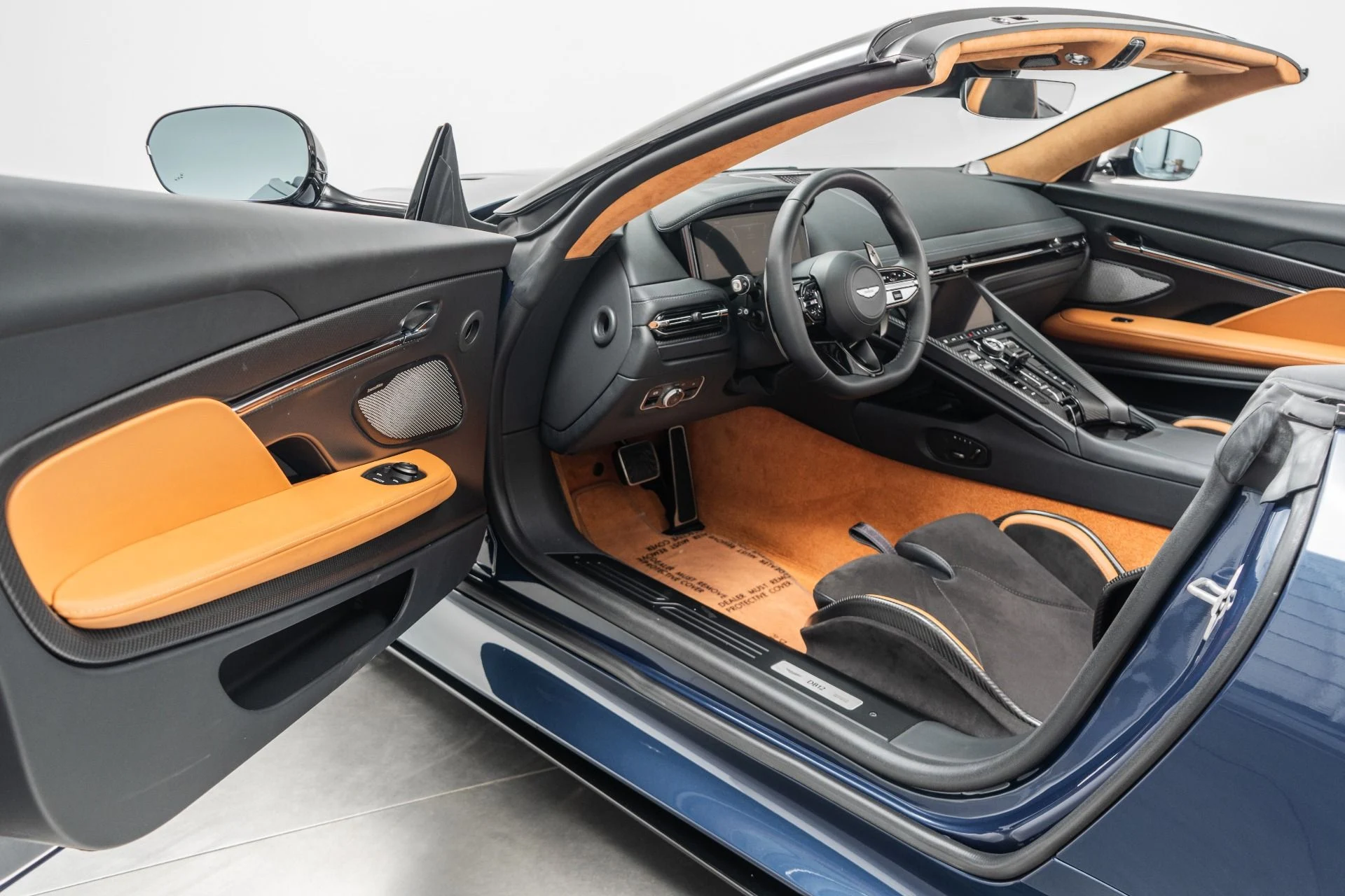 mph022_372013912_Used_2024_Aston_Martin_DB_12_Volante_Carbon_Fiber_Bucket_Seats_Heritage_Paint_Color_1773867859_1c7f3133e5