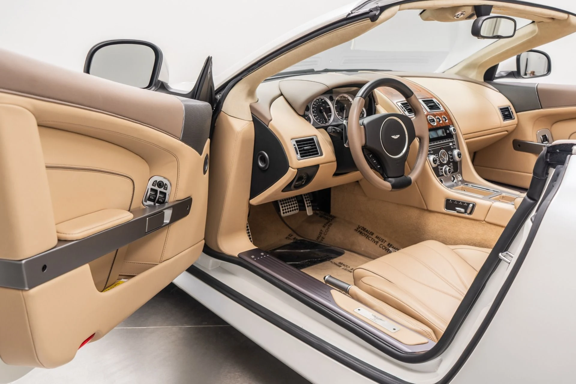 mph022_3769041199_Used_2014_Aston_Martin_DB_9_Volante_Very_Low_Miles_Pearlescent_Paint_V12_Power_1773670824_104752841b