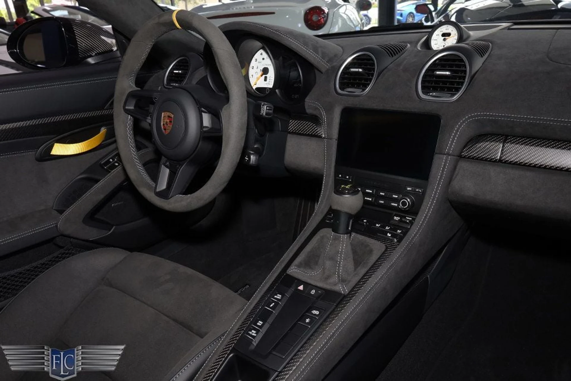 mph023_1171889540_used_2025_porsche_718_cayman_gt4rscoupe_6305_22896205_24_1024_771653b4ba