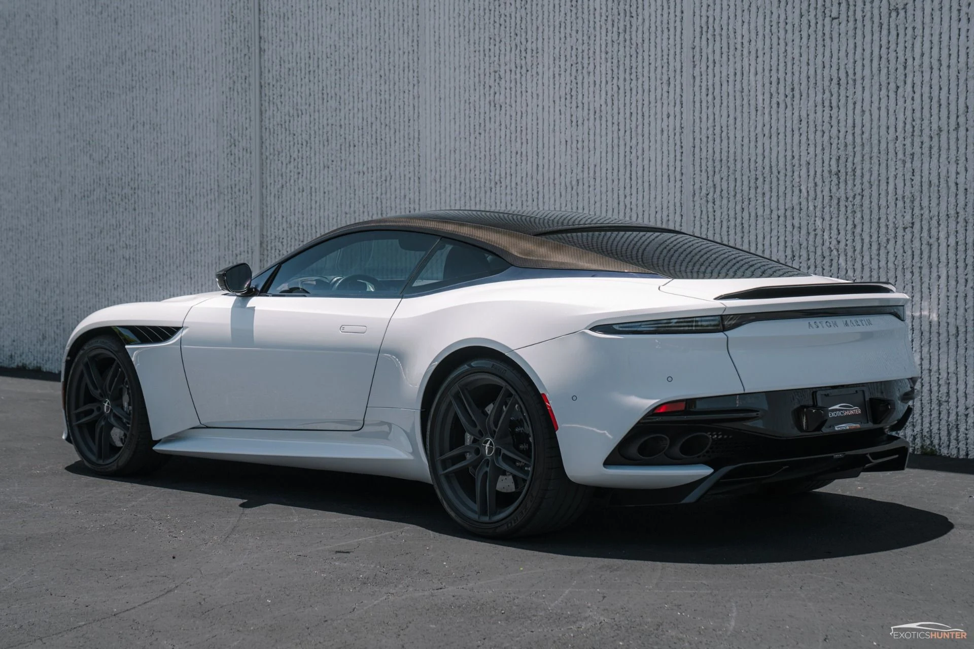 mph023_2069510278_Used_2019_Aston_Martin_DBS_Superleggera_in_White_Stone_w_Carbon_Exterior_1755546225_f4976be27f