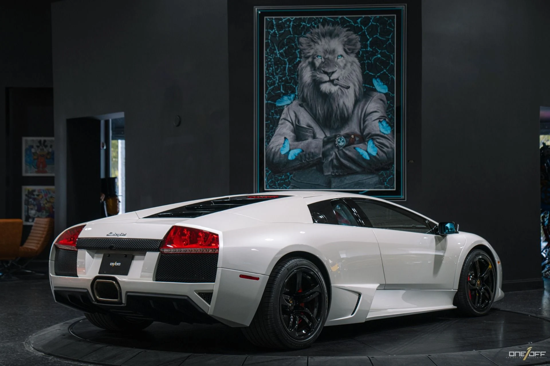 mph023_2812537739_Used_2009_Lamborghini_Murcielago_LP_640_in_Balloon_White_over_Red_Interior_w_Front_Lift_1754600274_0b7f7232f2