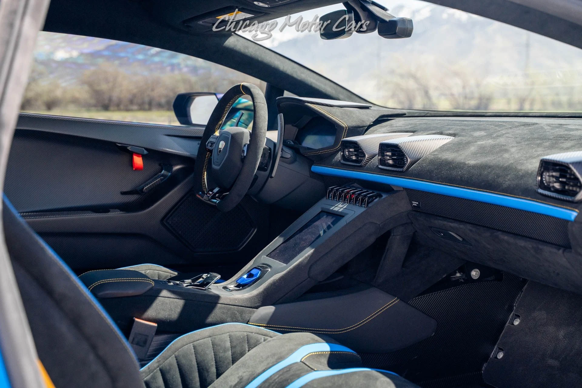 mph024_3092601044_Used_2023_Lamborghini_Huracan_STO_Original_MSRP_430k_Full_Exterior_Carbon_Pack_Blu_Nethuns_Full_PPF_1746050296_8ccf54658b