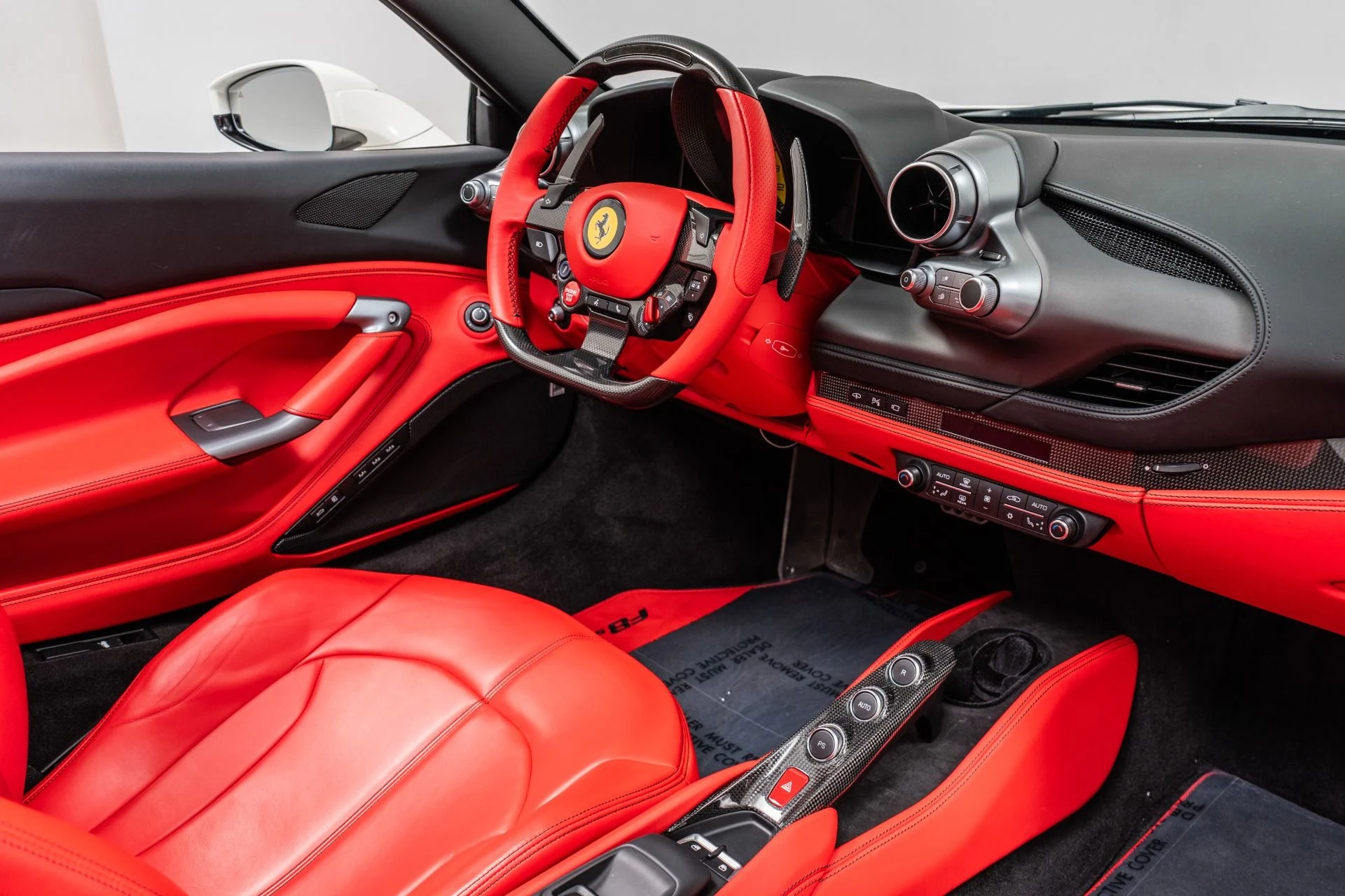 mph026_1505129677_Used_2023_Ferrari_F8_Spider_Low_Miles_Two_Tone_Paint_Carbon_Driving_Zone_Passenger_Display_1789405204_47e25244ec