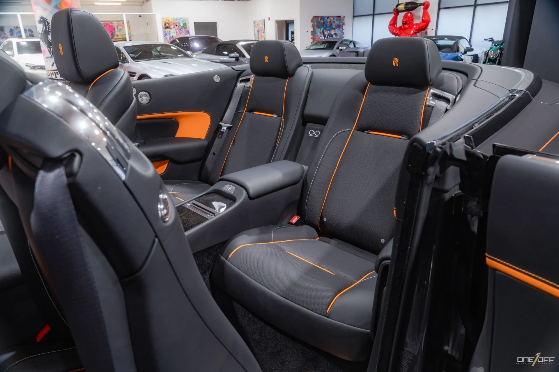 mph027_1644737564_Used_2018_Rolls_Royce_Dawn_1_of_1_Bespoke_Special_Order_Black_Badge_1731615753_21257cb002