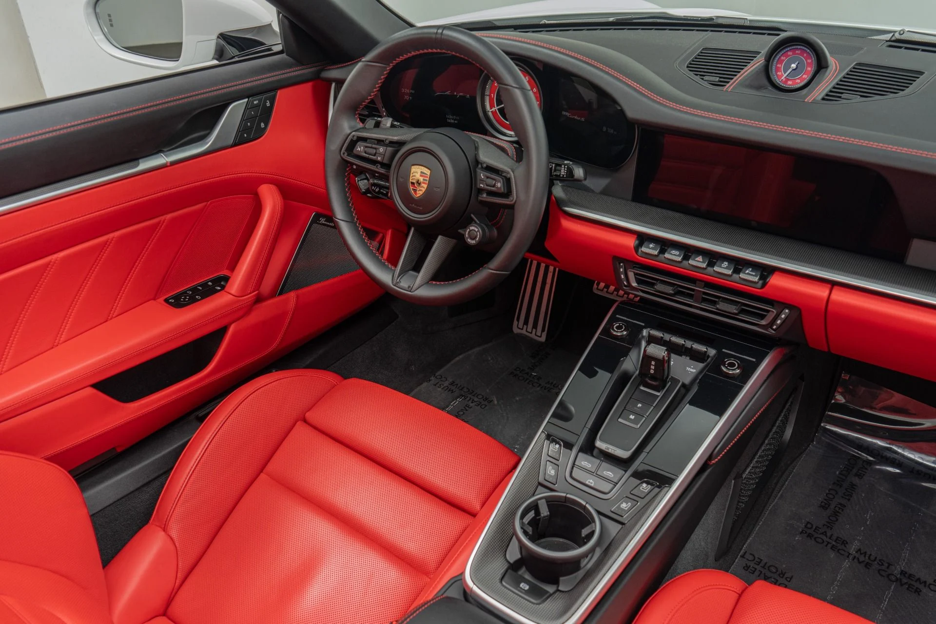 mph027_3060197535_Used_2024_Porsche_911_Turbo_S_Cabriolet_Sport_Design_Package_Exclusive_Manufaktur_Interior_1780002911_3bf128f97d
