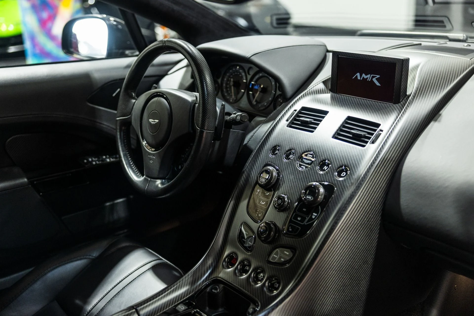 mph027_4126357596_Used_2019_Aston_Martin_Rapide_AMR_257000_MSRP_1764127123_facff2c66f