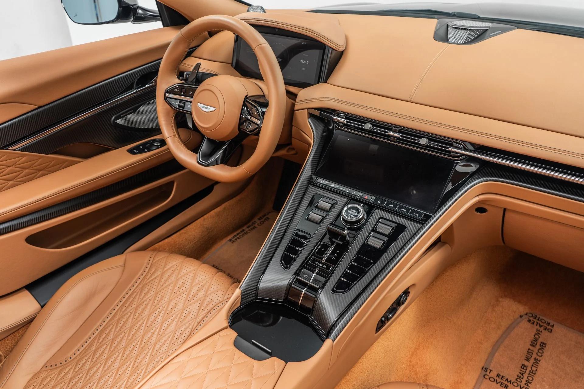 mph028_2037913566_Used_2024_Aston_Martin_DB_12_Volante_Low_Miles_86_K_in_Options_Gorgeous_Color_Combination_1774375825_e775e42c68