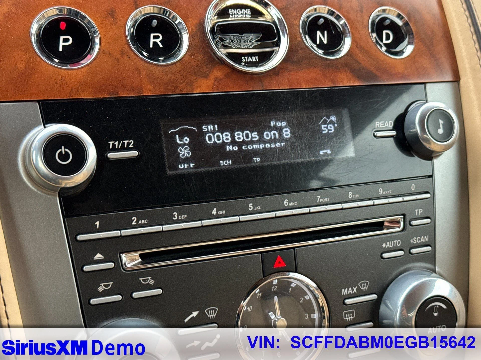 mph028_2104379509_Used_2014_Aston_Martin_DB_9_Volante_1769008605_719c4d8e30