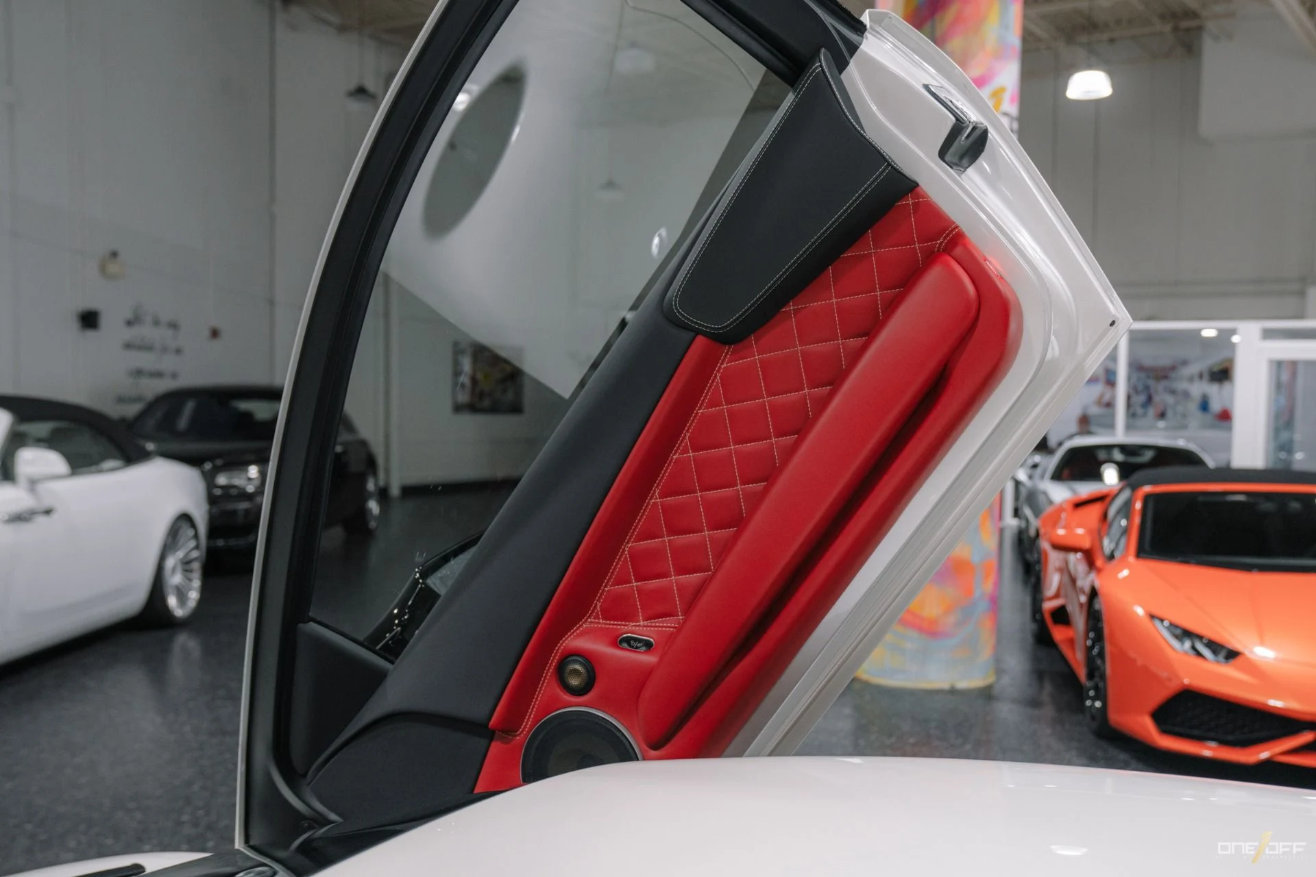 mph029_3349078283_Used_2009_Lamborghini_Murcielago_LP_640_in_Balloon_White_over_Red_Interior_w_Front_Lift_1754600274_91b65f066f