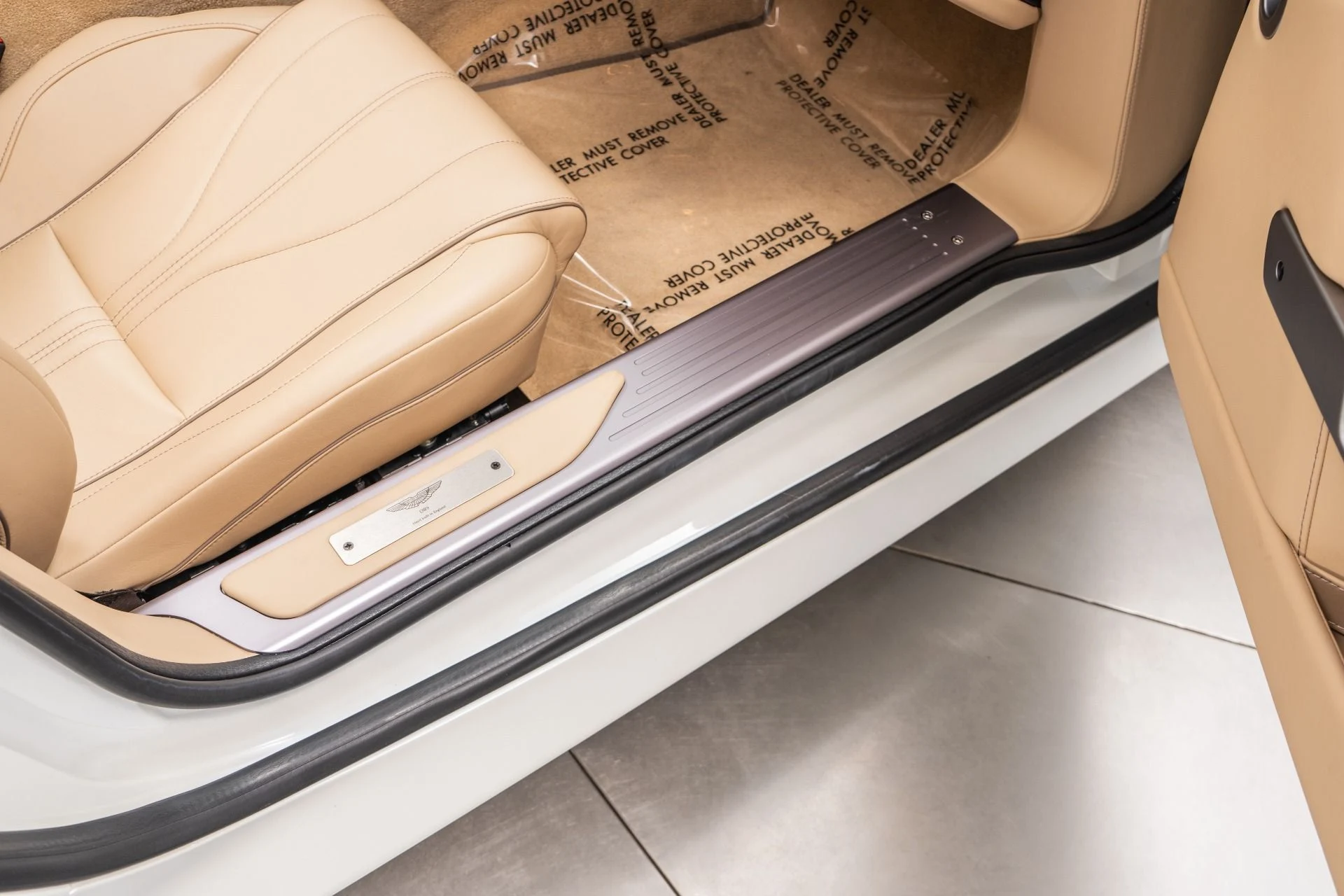 mph030_1851022796_Used_2014_Aston_Martin_DB_9_Volante_Very_Low_Miles_Pearlescent_Paint_V12_Power_1773670824_dc8921c2fd