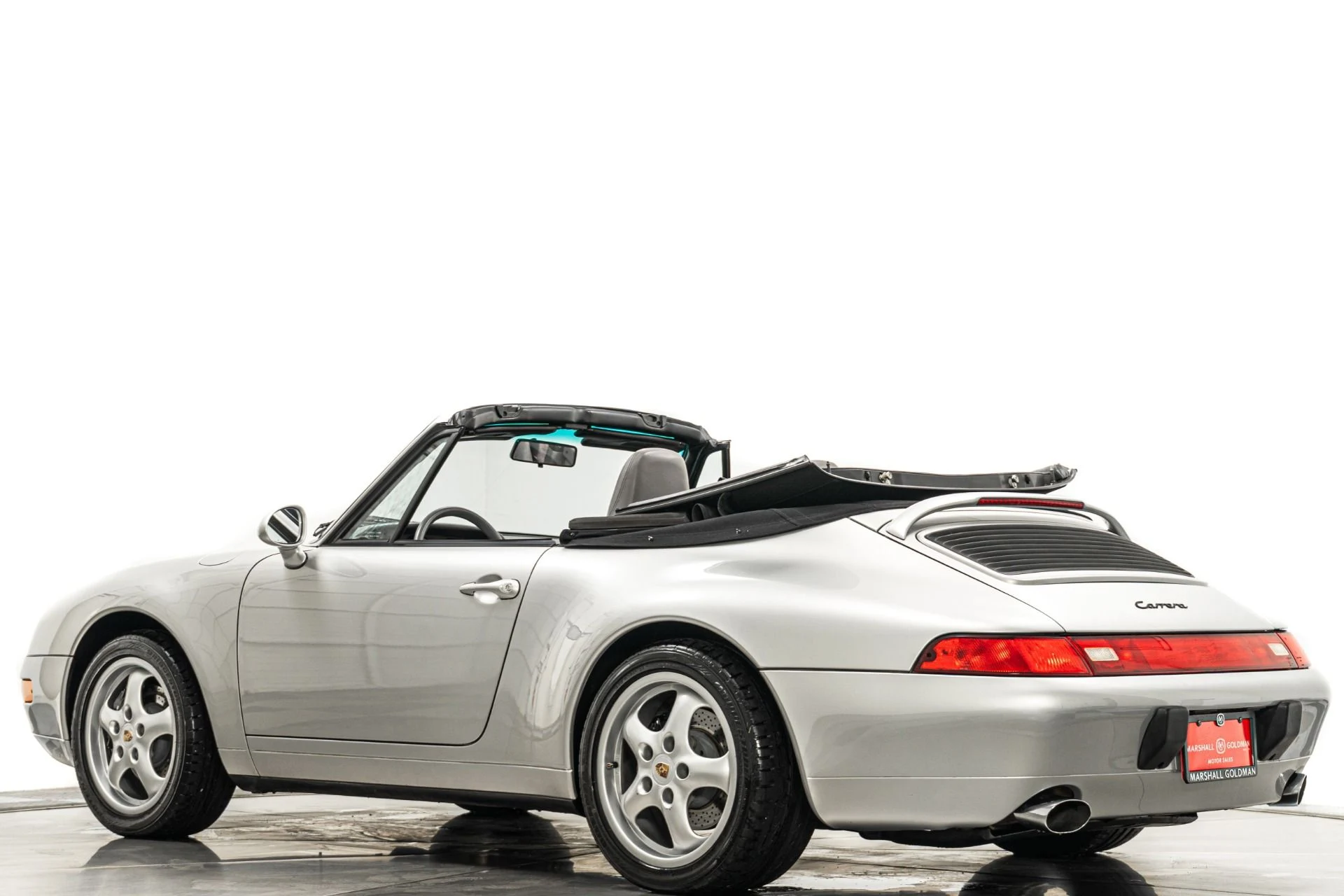 mph030_2263538412_Used_1997_Porsche_911_Carrera_Cabriolet_Tiptronic_Heated_Power_Seats_Supple_Leather_1767644334_0fb5657ce8