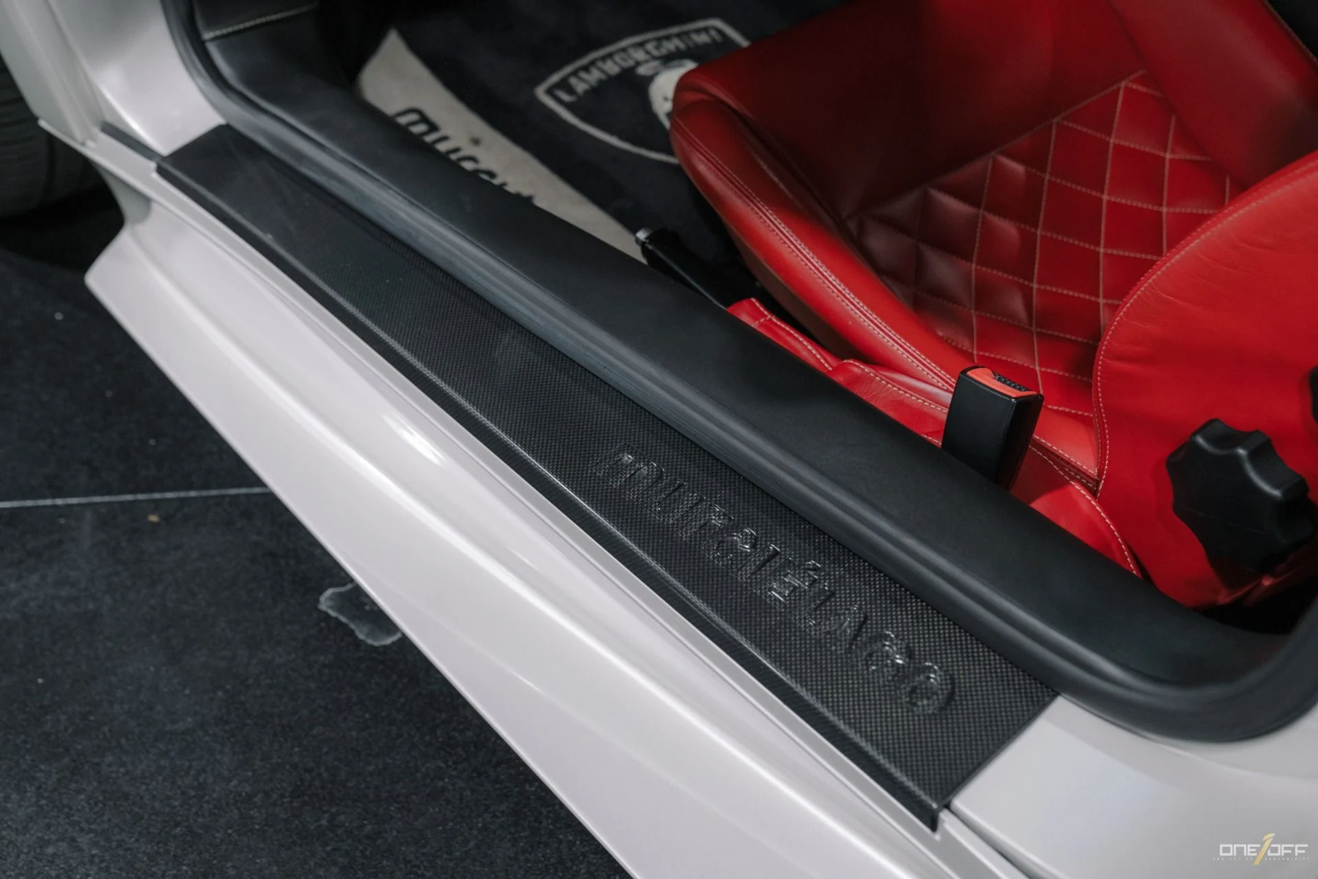 mph030_3961987905_Used_2009_Lamborghini_Murcielago_LP_640_in_Balloon_White_over_Red_Interior_w_Front_Lift_1754600274_cc8c3cfc27