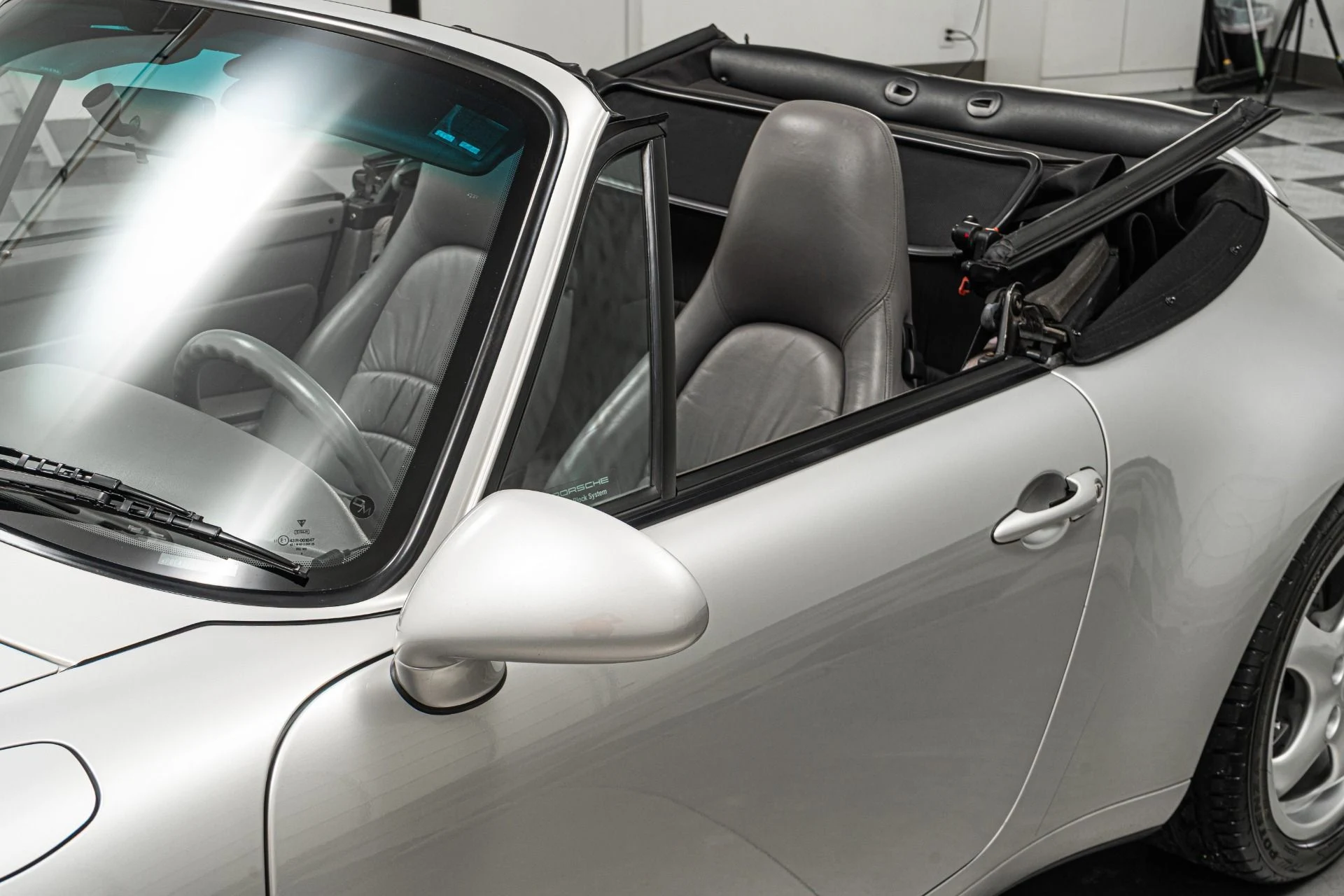 mph032_3940430456_Used_1997_Porsche_911_Carrera_Cabriolet_Tiptronic_Heated_Power_Seats_Supple_Leather_1767644334_6c2d7b266f