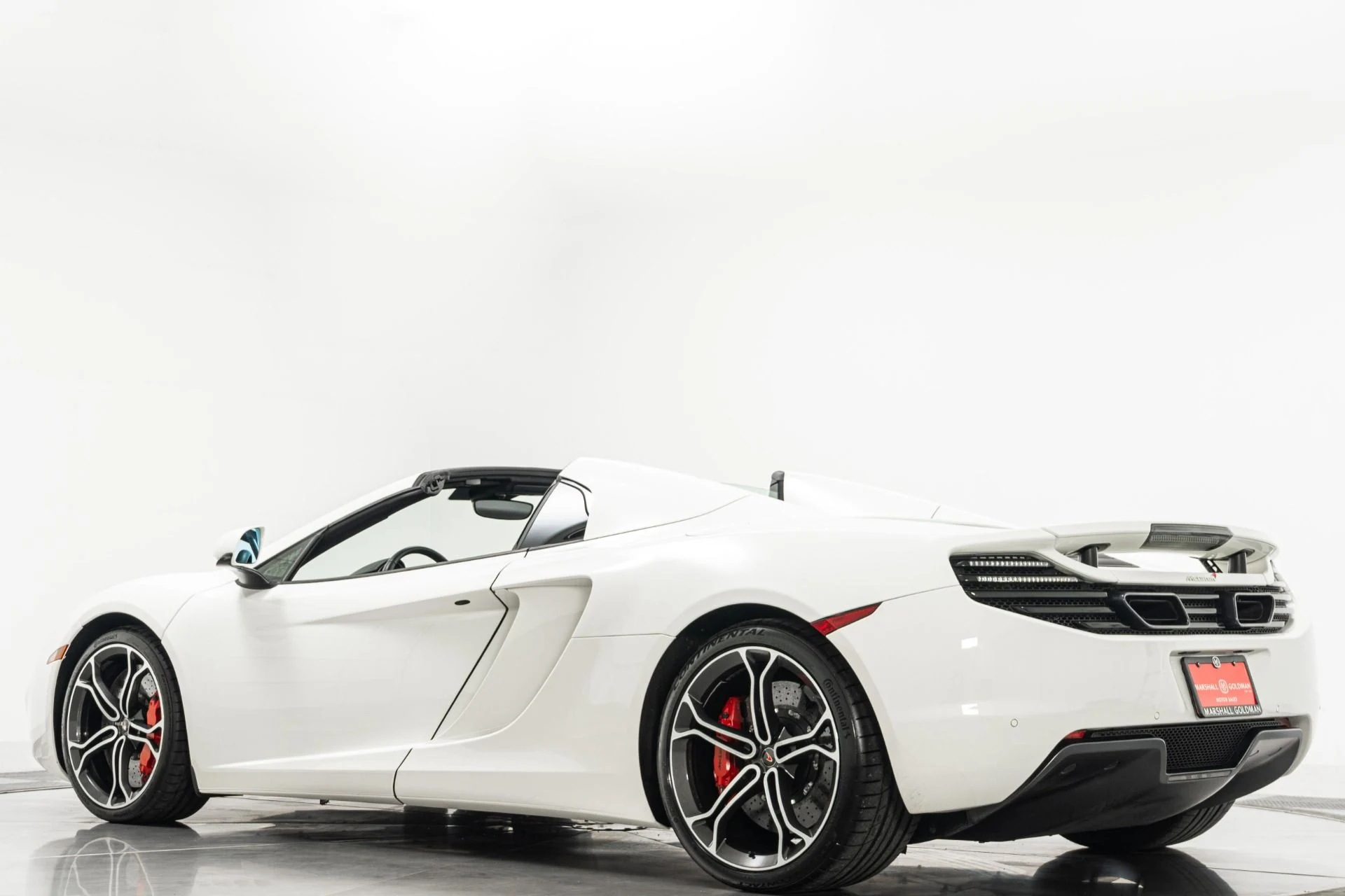 mph035_3261682802_Used_2014_Mc_Laren_MP_4_12_C_Spider_Retractable_Hardtop_616_Horsepower_Low_Miles_1779912312_e39d050b41