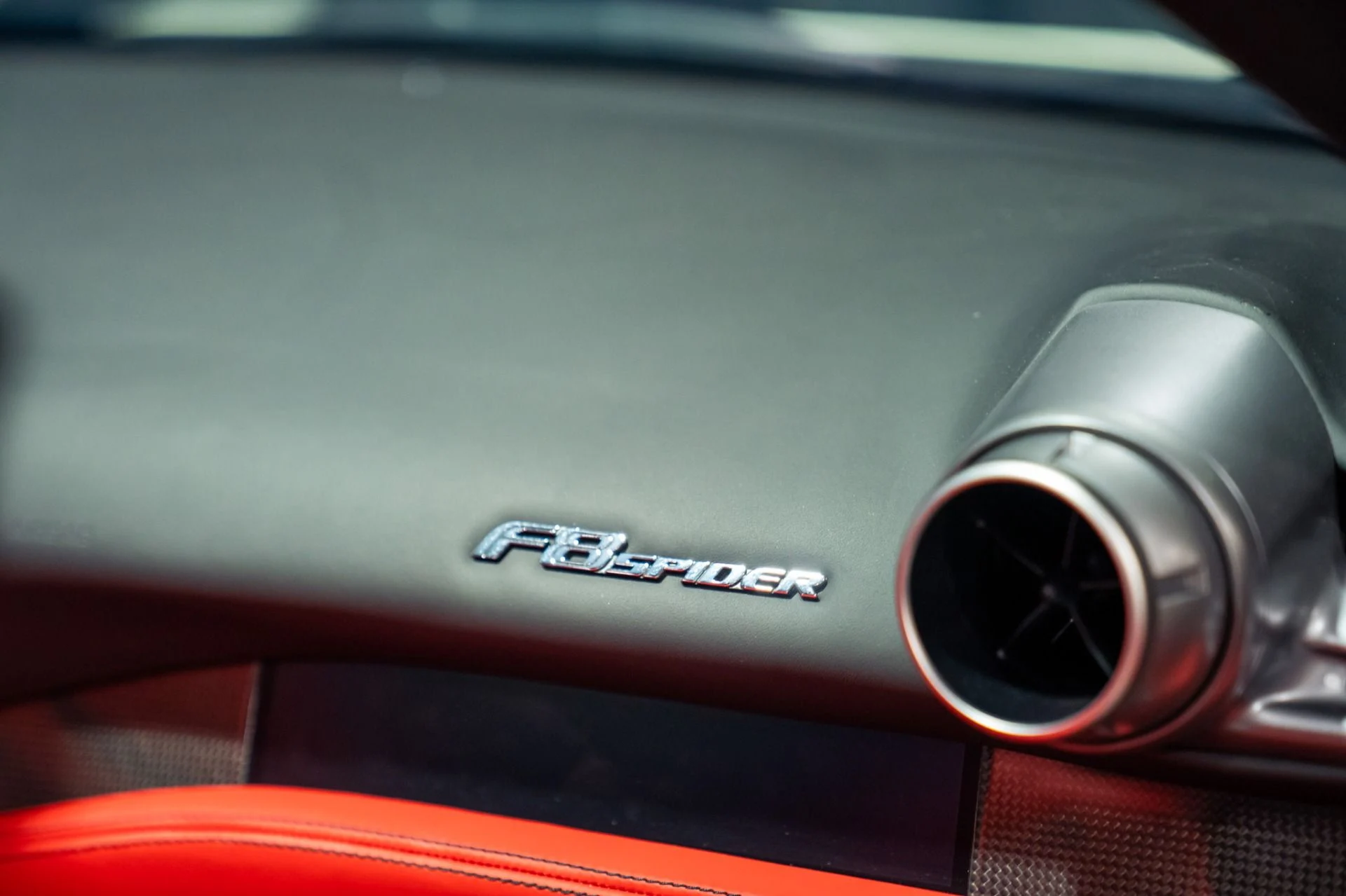 mph036_1736319022_Used_2023_Ferrari_F8_Spider_Passenger_Display_Front_Lift_1785938596_7368d7dbba