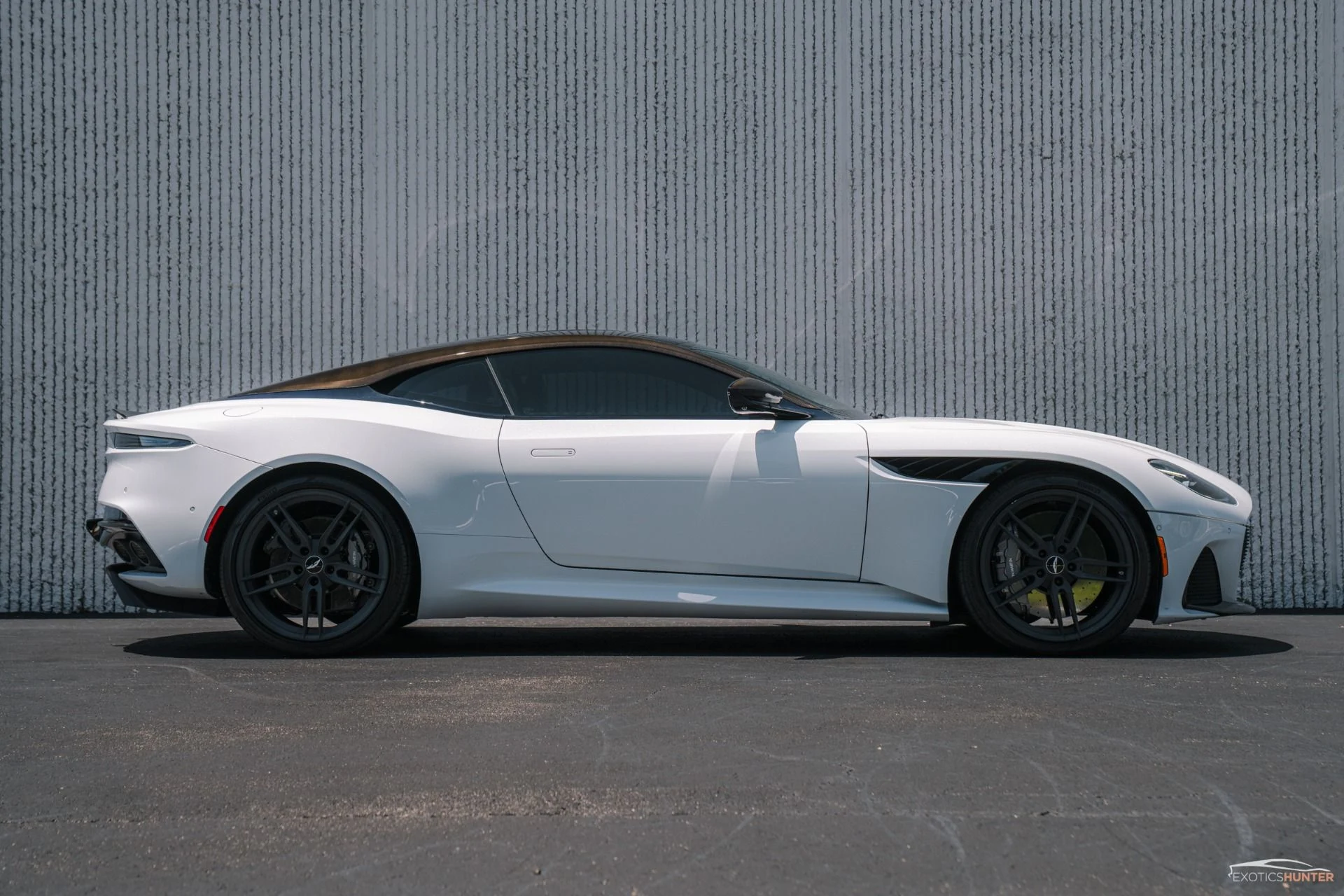 mph037_130600919_Used_2019_Aston_Martin_DBS_Superleggera_in_White_Stone_w_Carbon_Exterior_1755546167_aff328733a