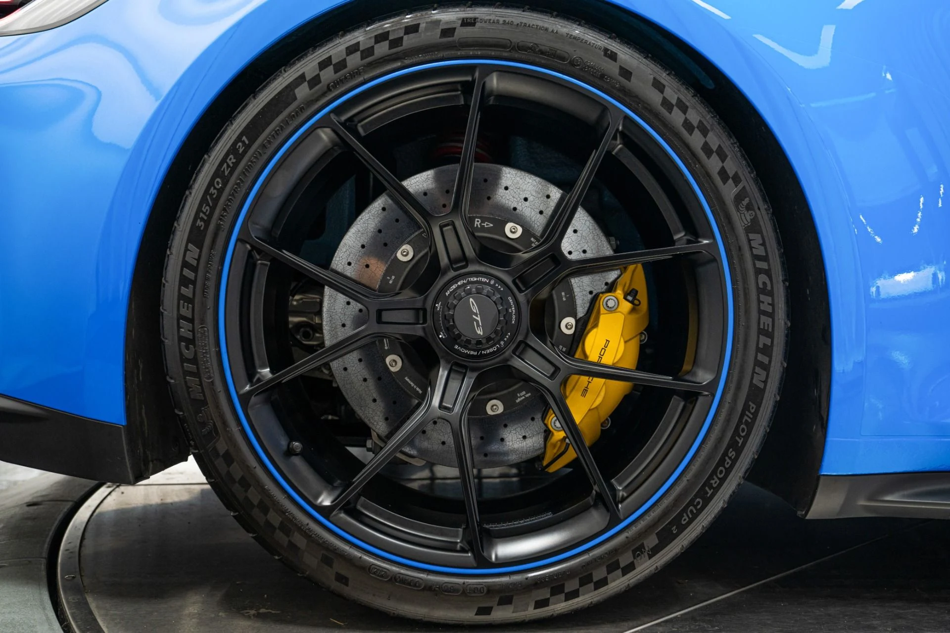 mph037_3465901663_Used_2022_Porsche_911_GT_3_6_Speed_Manual_Low_Miles_Carbon_Roof_Blue_Stitching_1762802258_4ed4538bfd