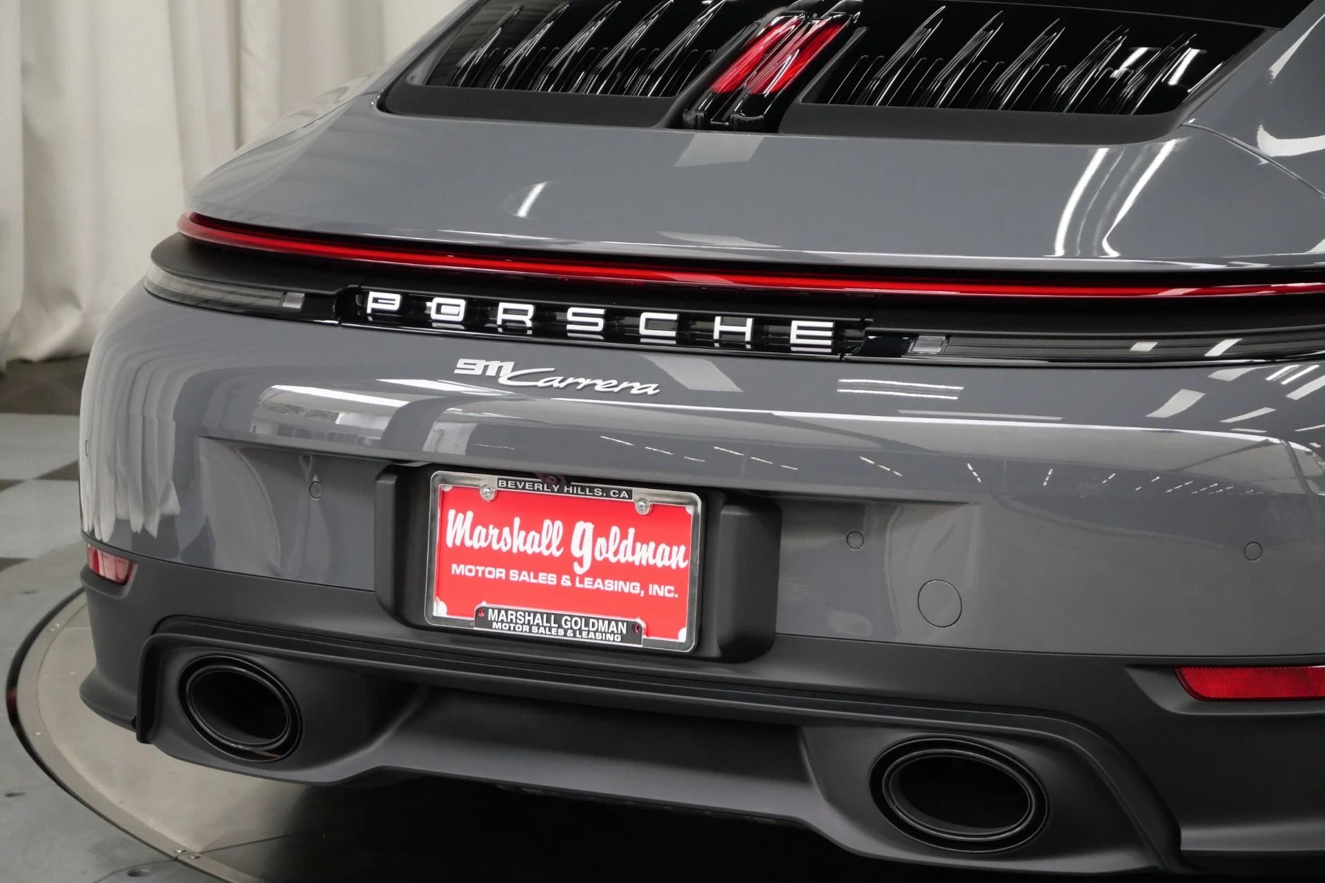 mph037_3575884005_Used_2025_Porsche_911_Carrera_Low_Miles_Premium_Package_Front_Axle_Lift_1756231403_2f773a4fff