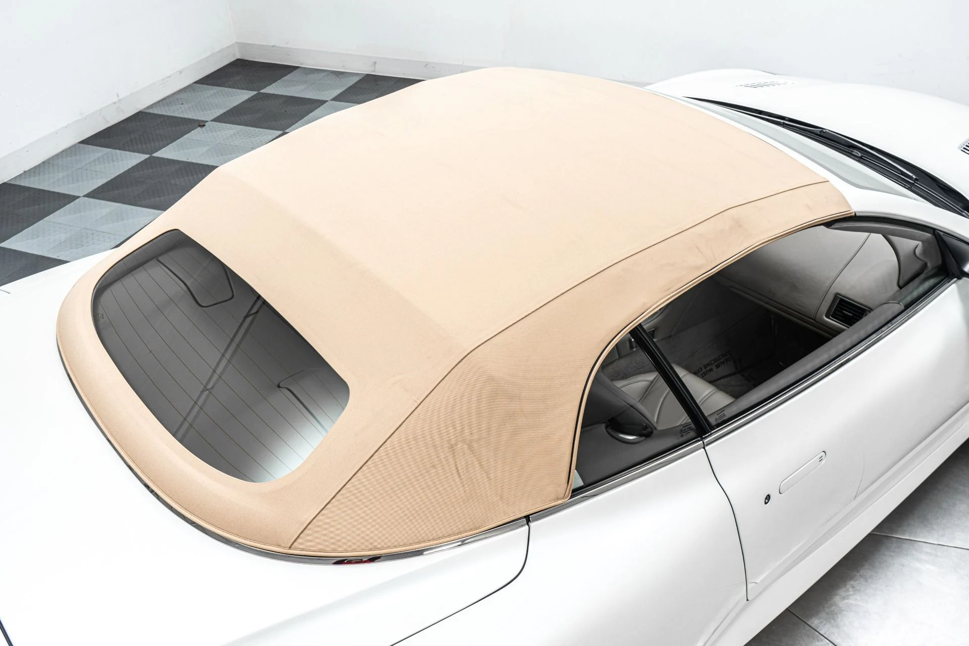 mph037_3898764118_Used_2014_Aston_Martin_DB_9_Volante_Very_Low_Miles_Pearlescent_Paint_V12_Power_1773670824_0cf5da9868