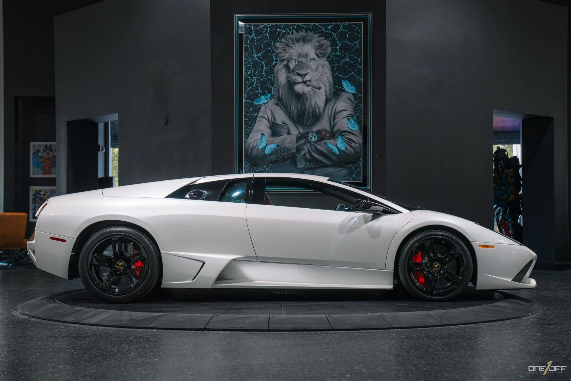 mph038_1828287090_Used_2009_Lamborghini_Murcielago_LP_640_in_Balloon_White_over_Red_Interior_w_Front_Lift_1754600274_2cc2e06a84