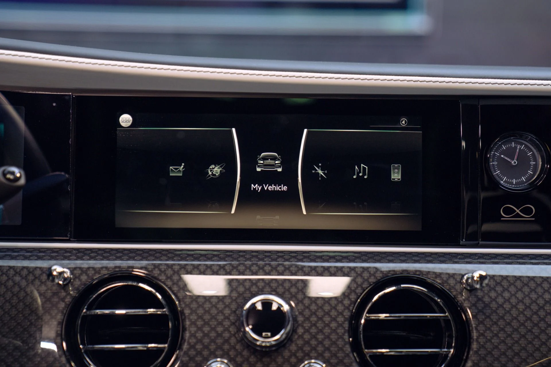 mph038_2618860910_Used_2022_Rolls_Royce_Black_Badge_Ghost_Rear_Theater_and_Trays_Full_Carbon_Interior_Package_1790797785_8a9f0f8a62