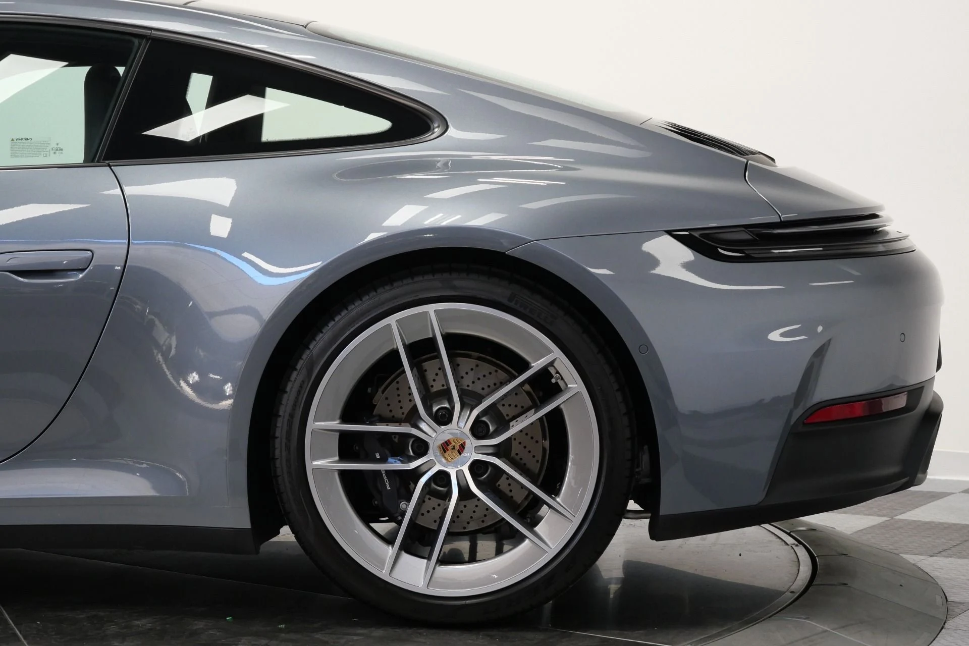 mph038_3605169639_Used_2025_Porsche_911_Carrera_Premium_Package_Sport_Exhaust_1768503028_71a8560e06