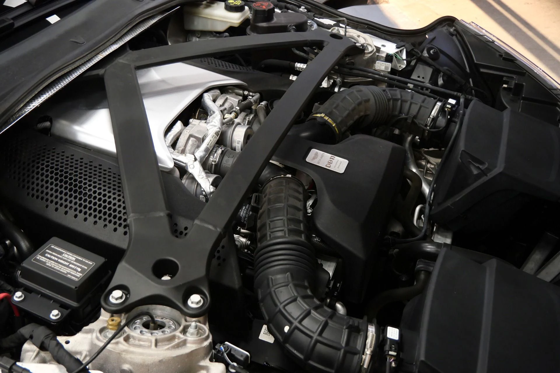 mph038_4089583400_Used_2020_Aston_Martin_DB_11_Volante_Gloss_Black_Trim_Electron_Yellow_Stitching_1776805913_f6f58c2c92