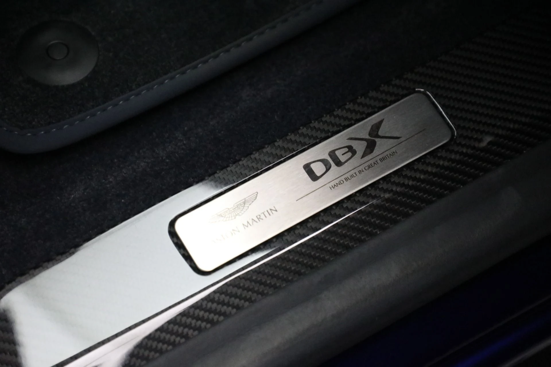 mph040_2110436222_Used_2024_Aston_Martin_DBX_707_1761597901_96ed64940e