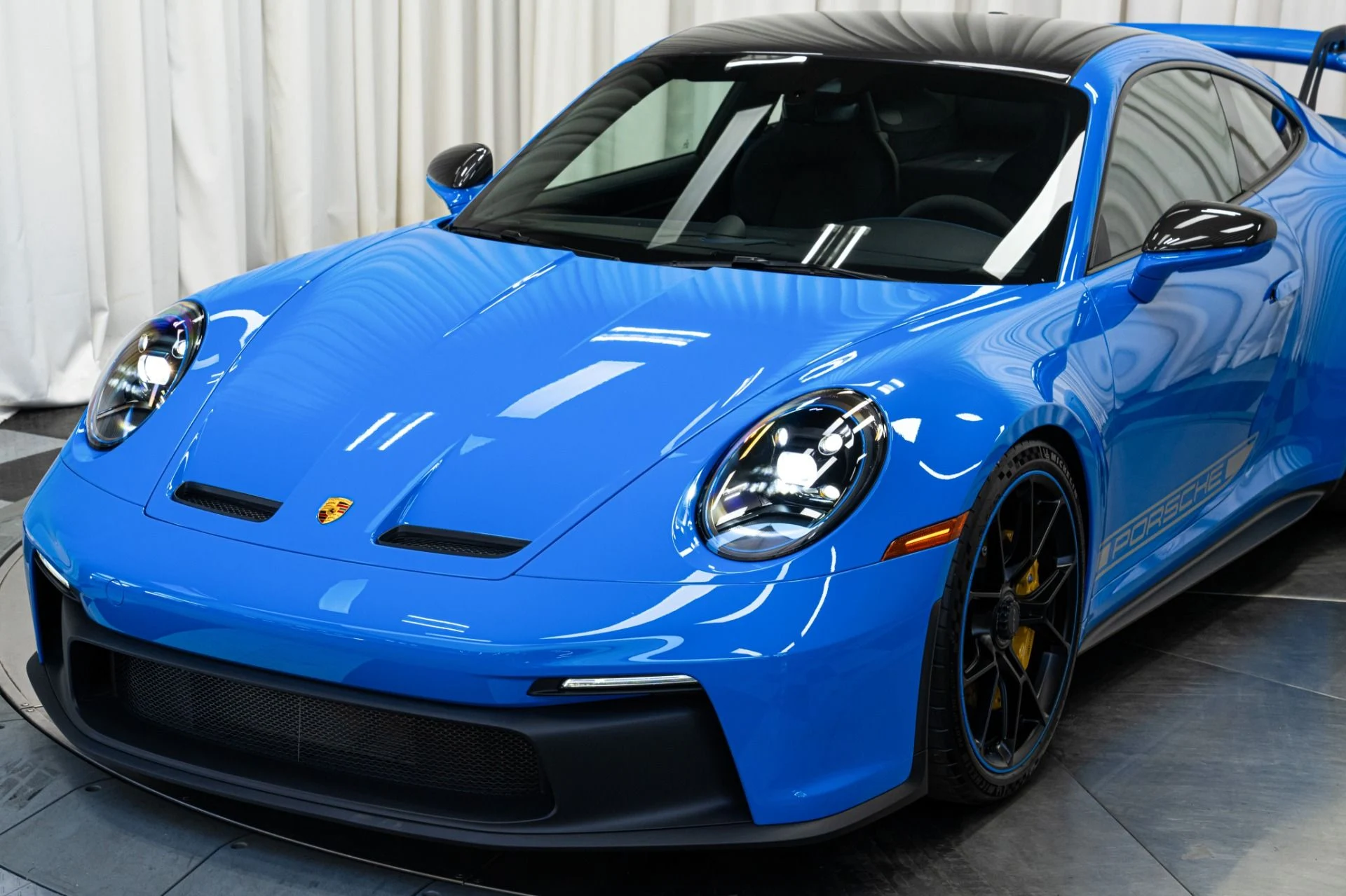 mph040_702339602_Used_2022_Porsche_911_GT_3_6_Speed_Manual_Low_Miles_Carbon_Roof_Blue_Stitching_1762802258_d4907d74d4