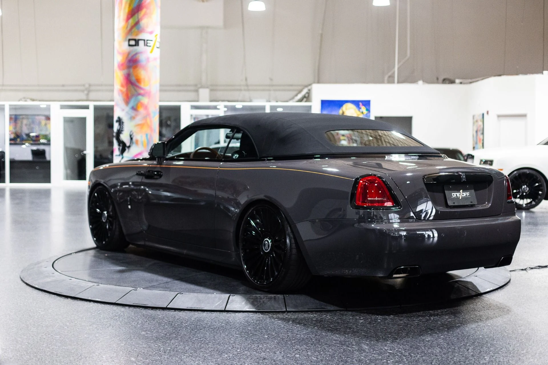 mph043_1800314884_Used_2018_Rolls_Royce_Dawn_1_of_1_Bespoke_Special_Order_Black_Badge_1773760361_f7674f2583