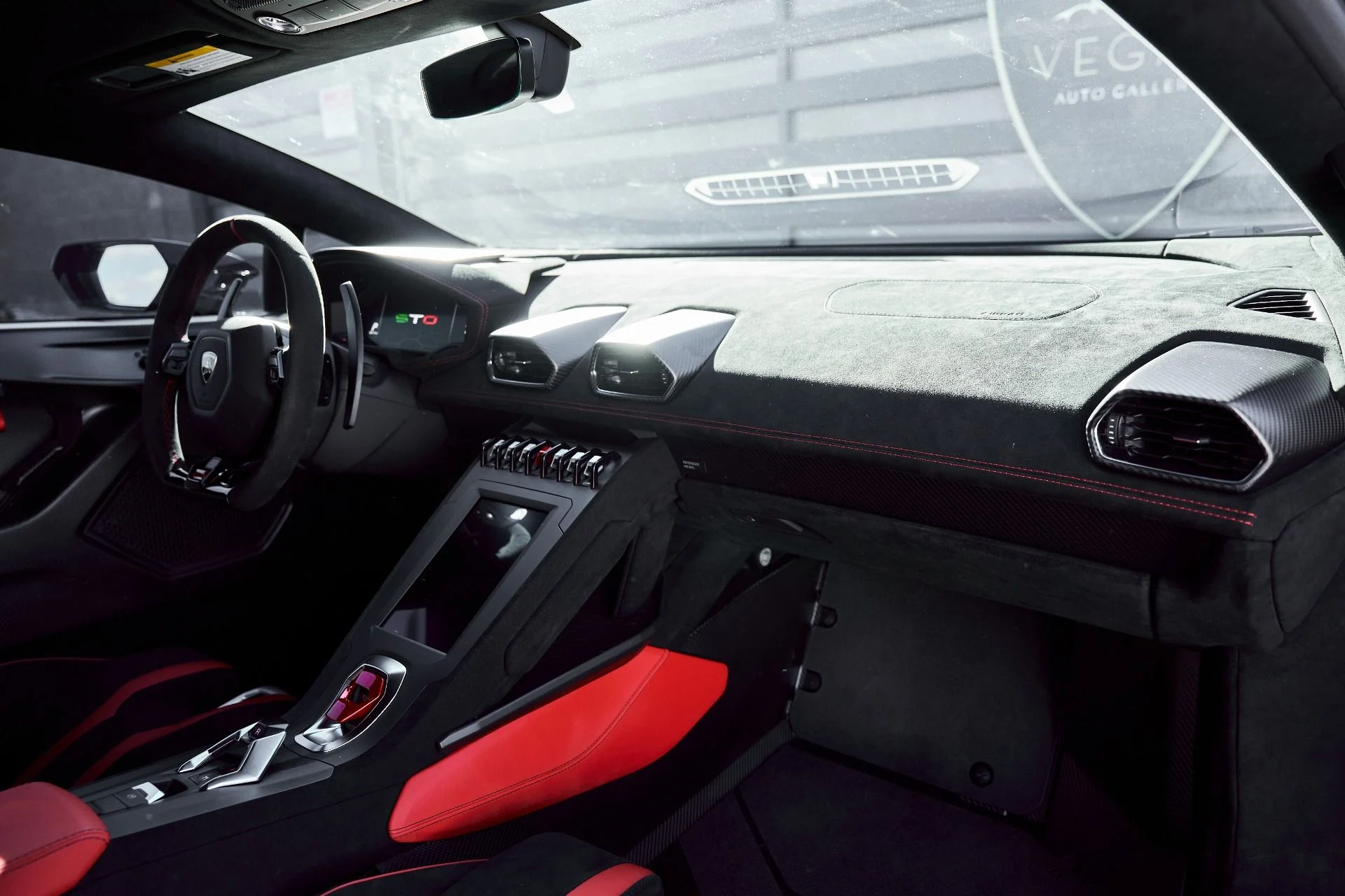 mph044_2779533537_Used_2023_Lamborghini_Huracan_STO_Base_1771381303_03fb9db2dc