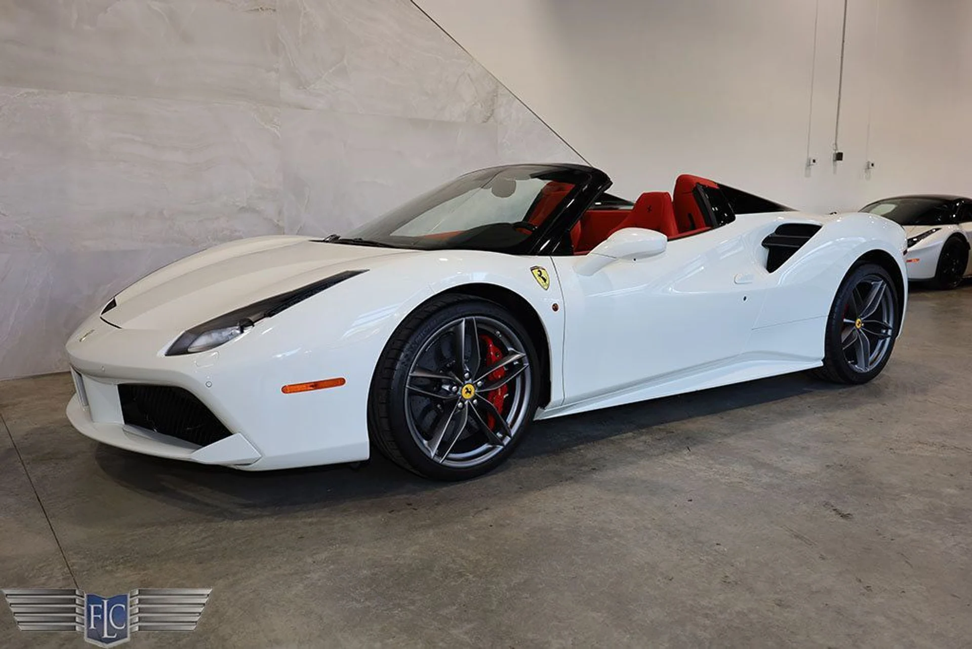mph049_2141402959_used_2019_ferrari_488_spider_convertible_9689_22223327_50_1024_59f0bfa8b6