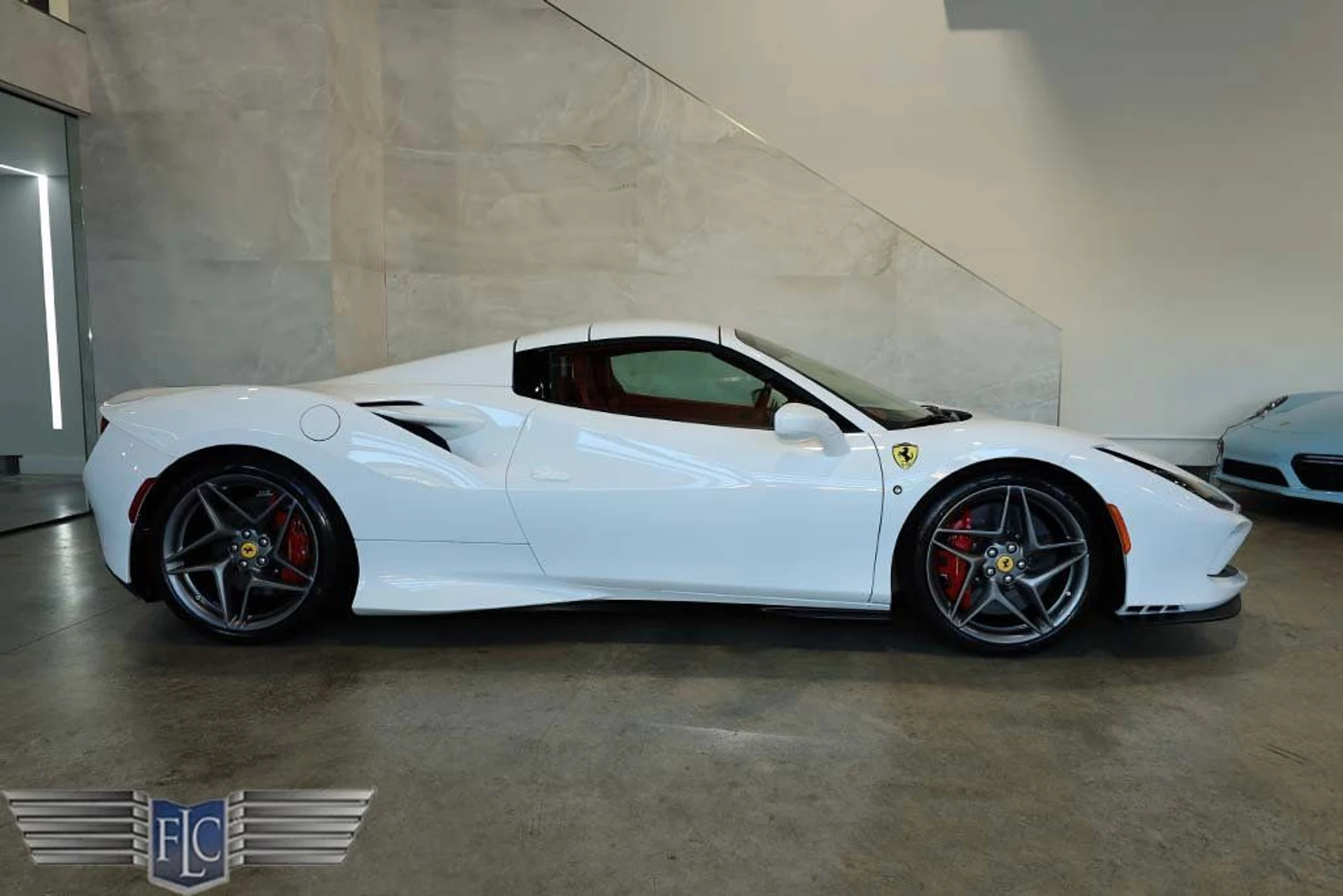 mph049_993592779_used_2023_ferrari_f8_spider_convertible_9689_22983772_50_1024_dada36ce37