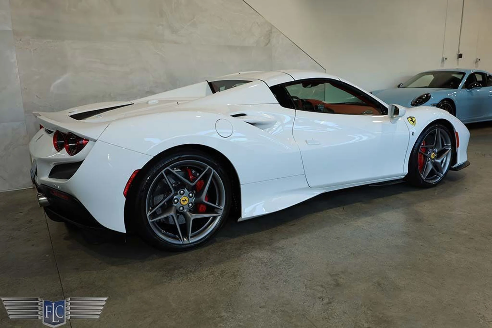 mph051_2822392244_used_2023_ferrari_f8_spider_convertible_9689_22983772_52_1024_f225e5df92