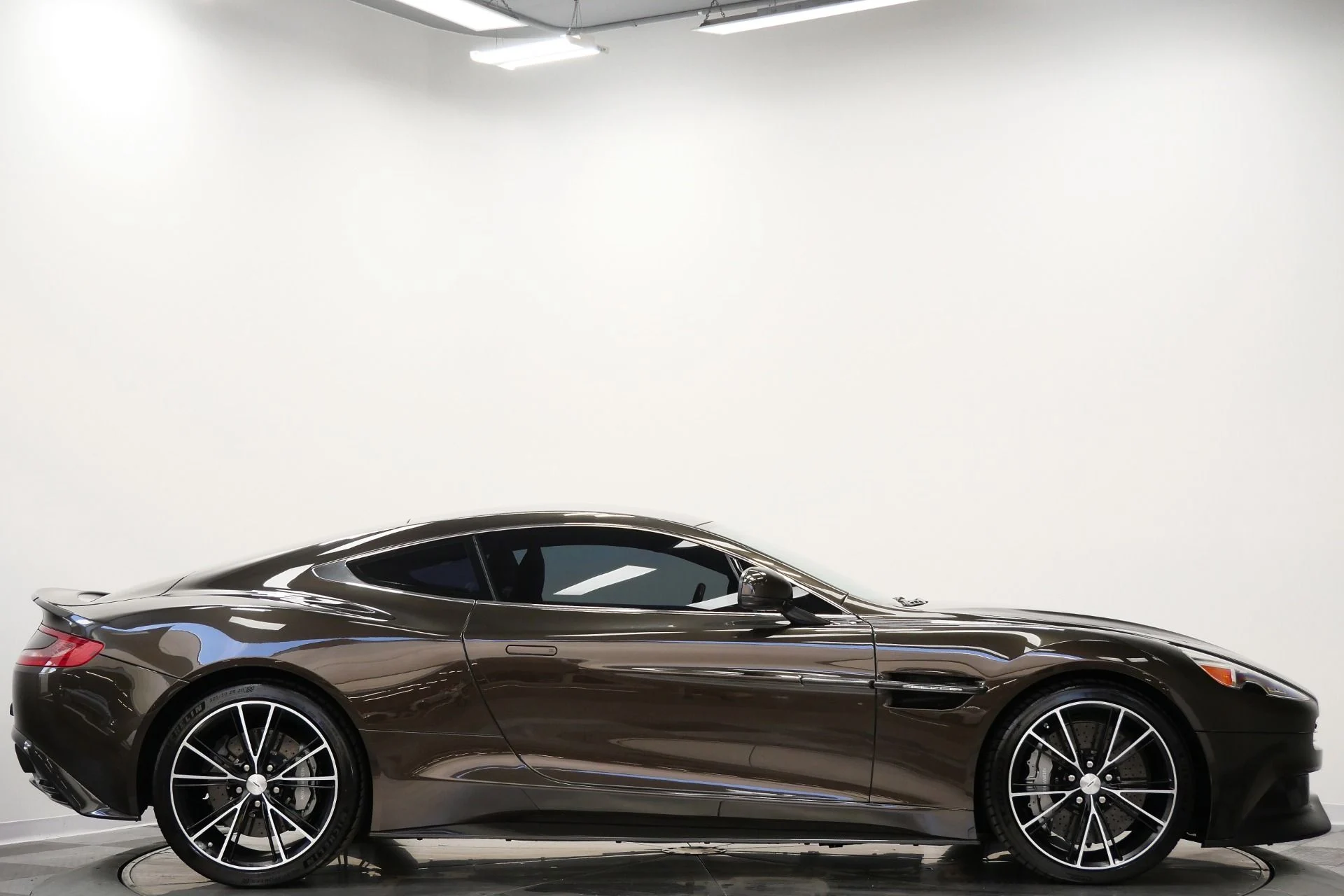 mph052_3431325113_Used_2014_Aston_Martin_Vanquish_Hourglass_Quilting_Beautiful_Color_V12_Power_1770409354_f5fa6a2de6