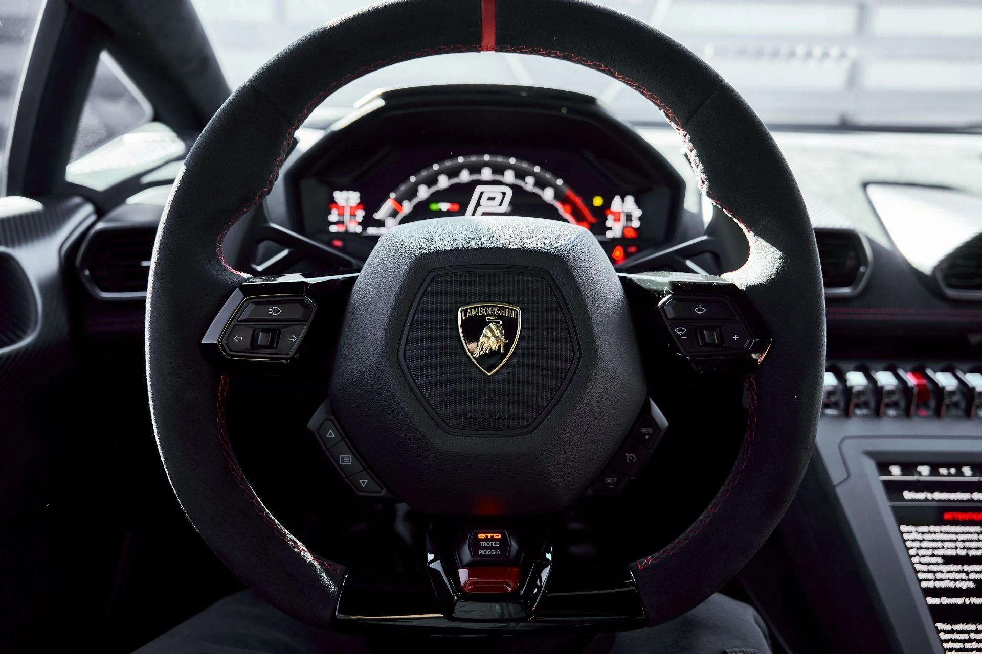 mph053_1949756563_Used_2023_Lamborghini_Huracan_STO_Base_1771381312_27871ac287