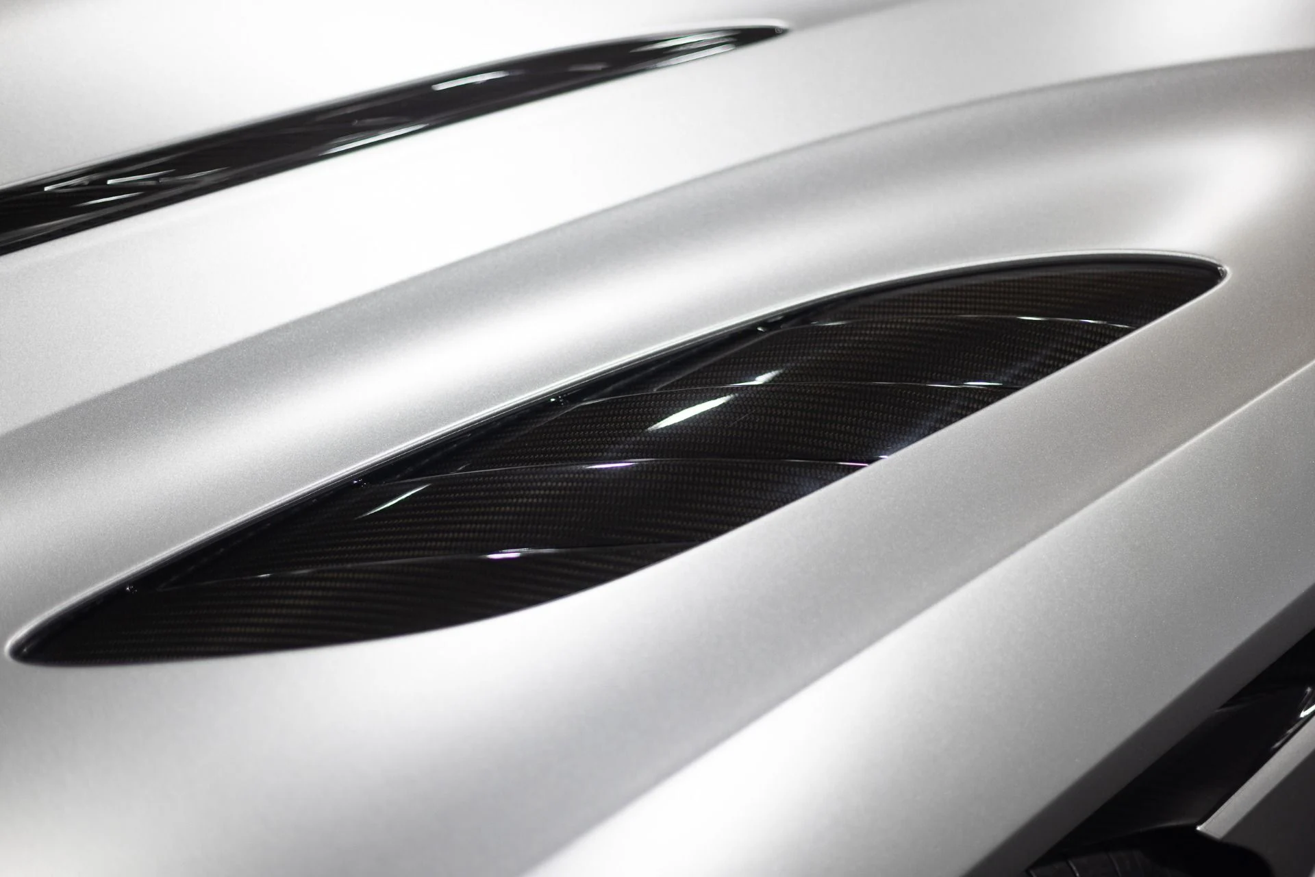 mph055_1915453656_Used_2023_Aston_Martin_DBS_770_Ultimate_Satin_Aluminite_Silver_Paint_Spicy_Red_Interior_HRE_522_M_1773415069_db1fe25b68