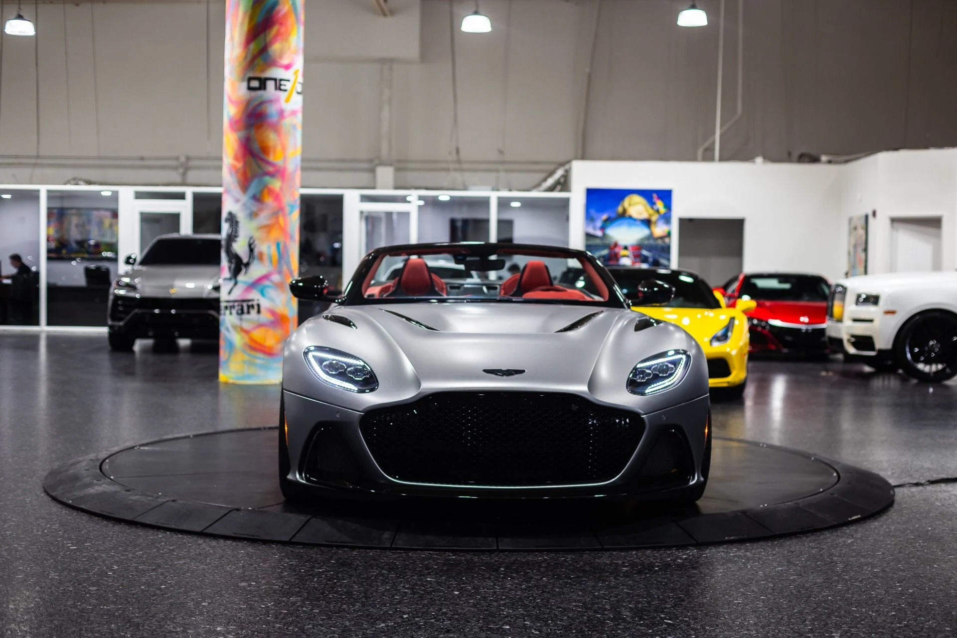 mph060_298580559_Used_2023_Aston_Martin_DBS_770_Ultimate_Satin_Aluminite_Silver_Paint_Spicy_Red_Interior_HRE_522_M_1773368429_fc249ad457