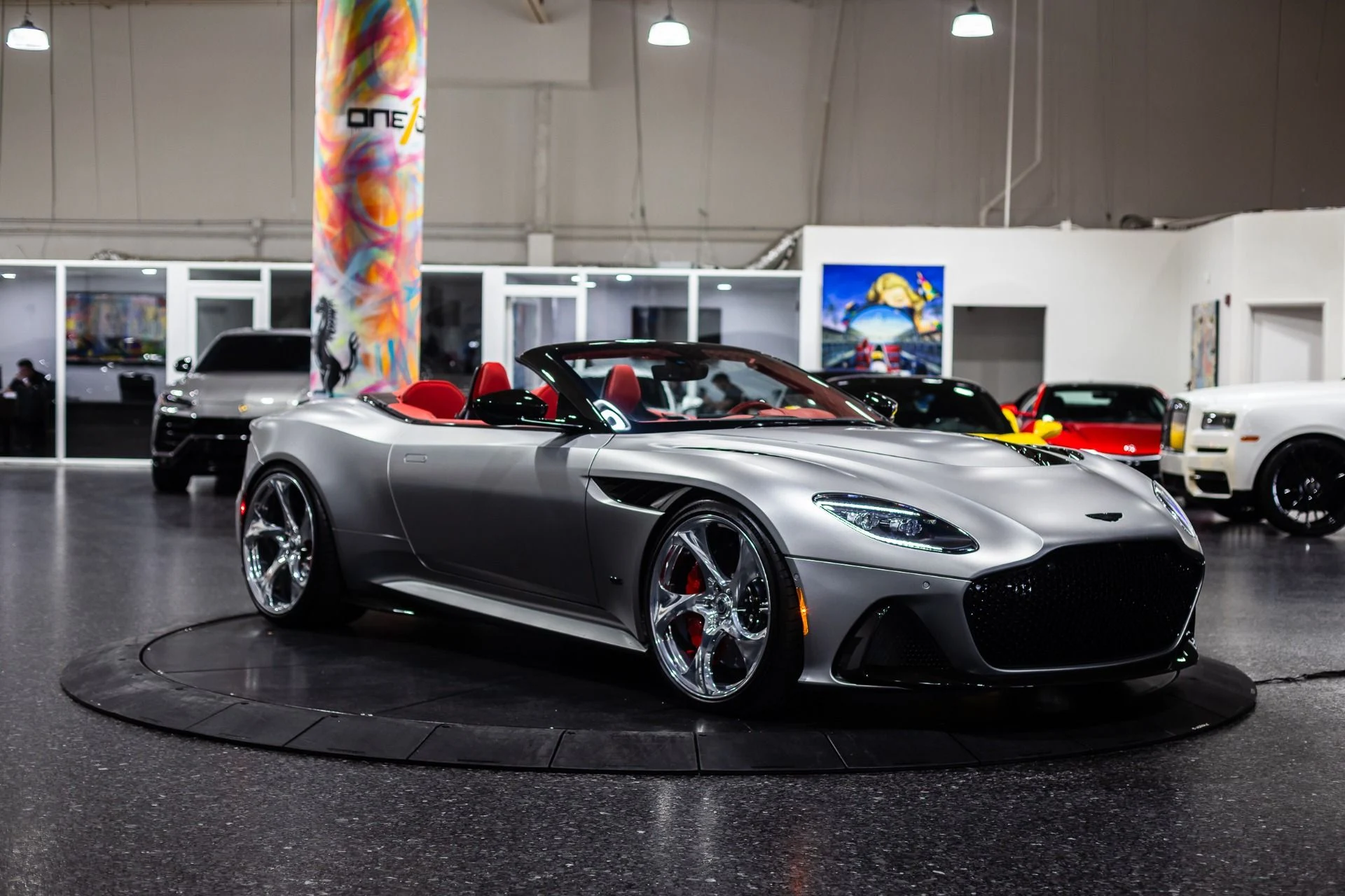 mph061_1798113653_Used_2023_Aston_Martin_DBS_770_Ultimate_Satin_Aluminite_Silver_Paint_Spicy_Red_Interior_HRE_522_M_1773368429_43b2e5914e